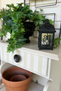 GFP Porch table with plant and lantern