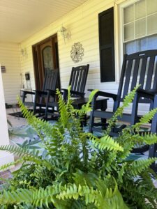 GFP Porch with black rockers and fern