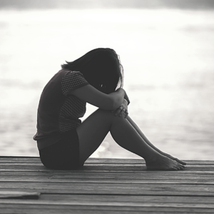 sad girl on dock