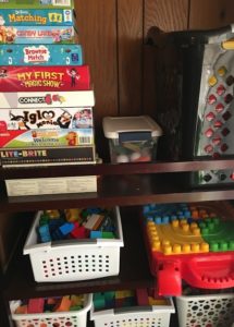 repurposed changing table with toys