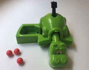 green toy hippo