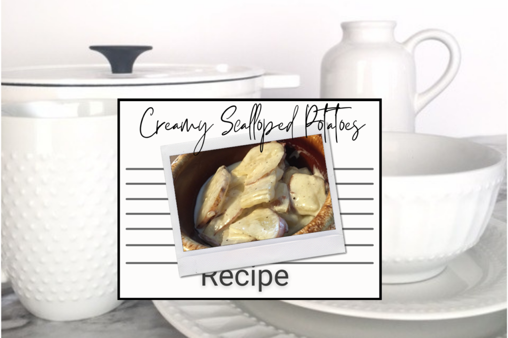 Featured Image Creamy Scalloped Potatoes in bowl