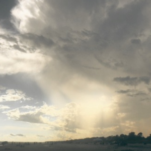 Beach clouds and sun